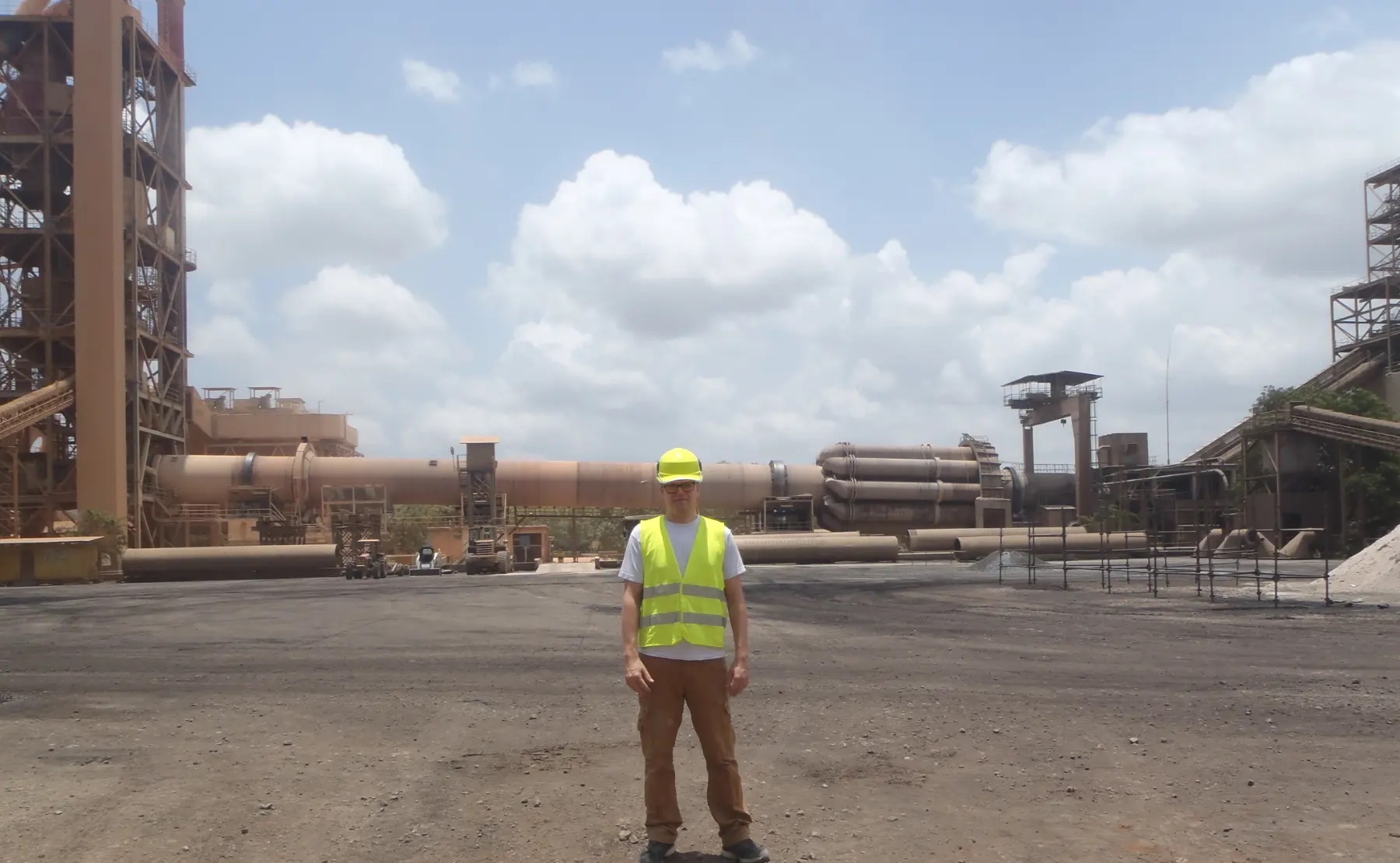 Morten Jensen of Amager Engineering on site in front of a rotary kiln at a cement plant