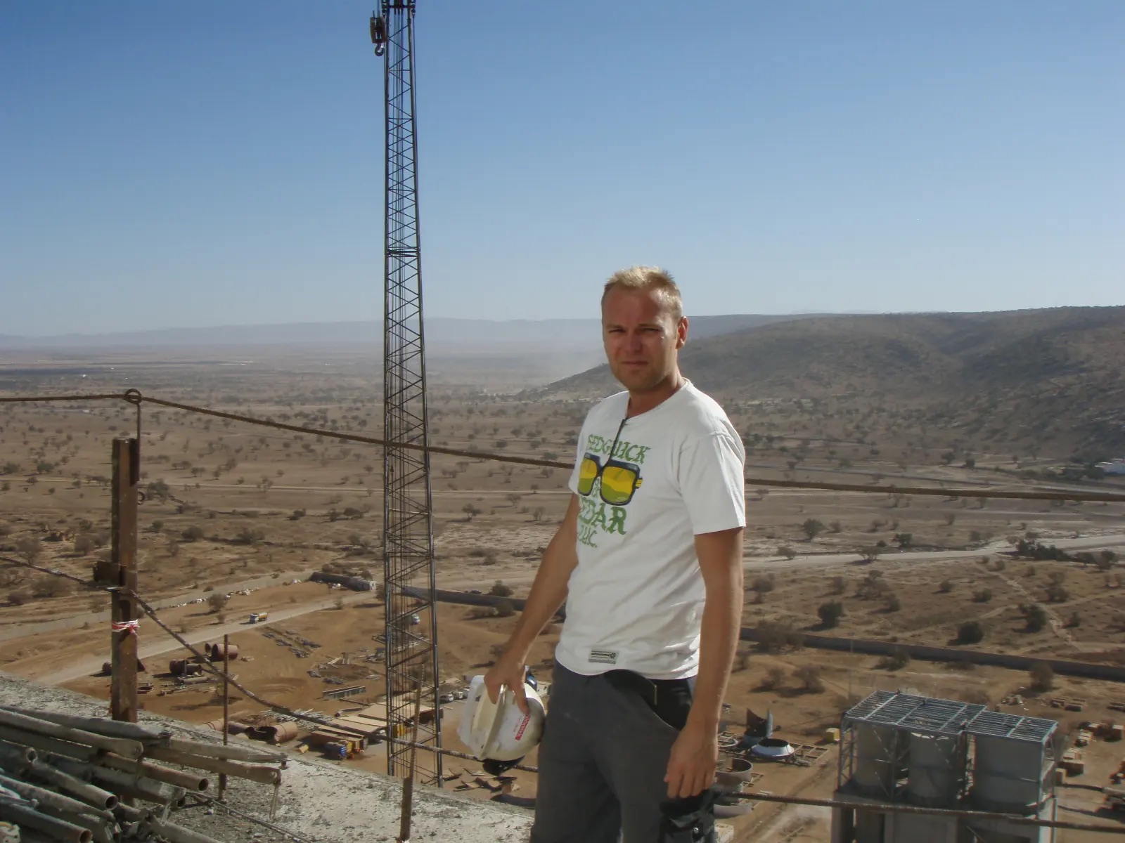 Morten Jensen on site abroad with a view over the plant